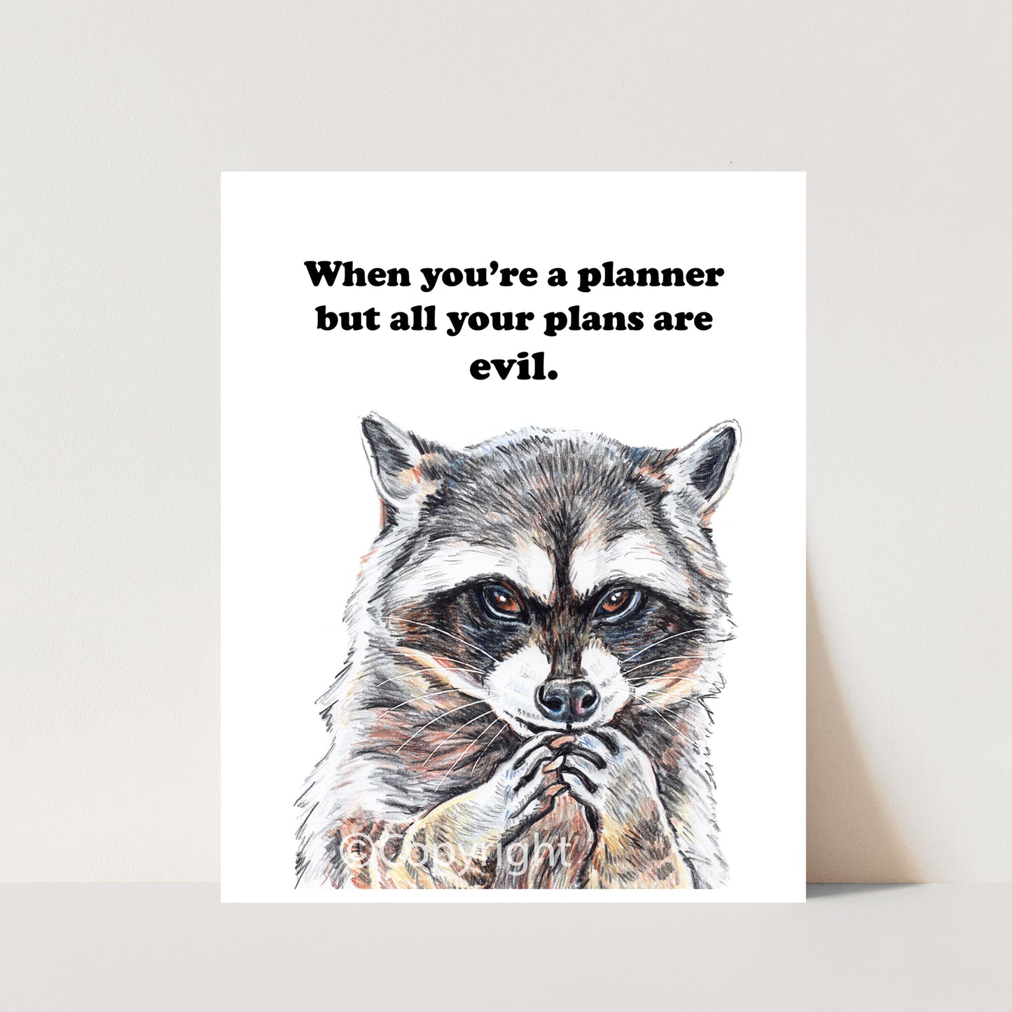 Crayon drawing of raccoon who is planning his next evil scheme. Art by Deidre Wicks