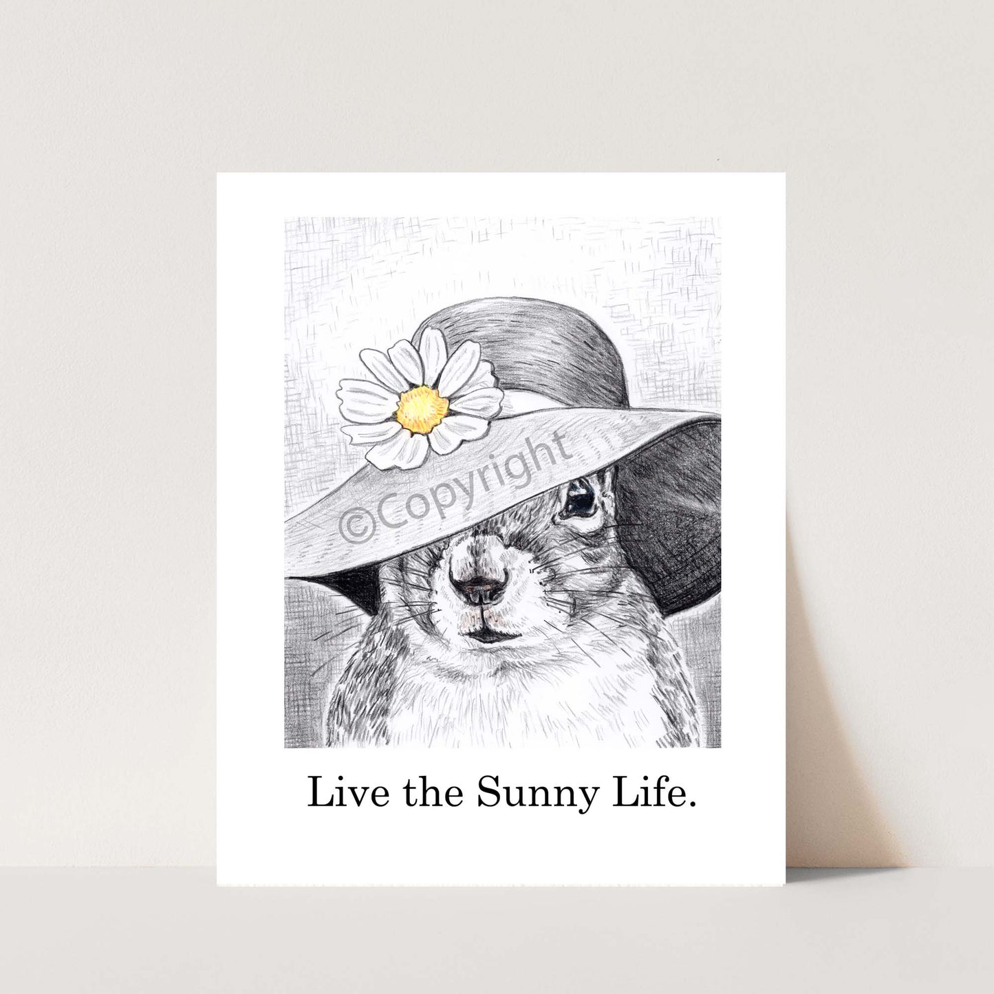 Crayon drawing of a squirrel wearing a big floppy sun hat with a daisy on the brim. Art by Deidre Wicks