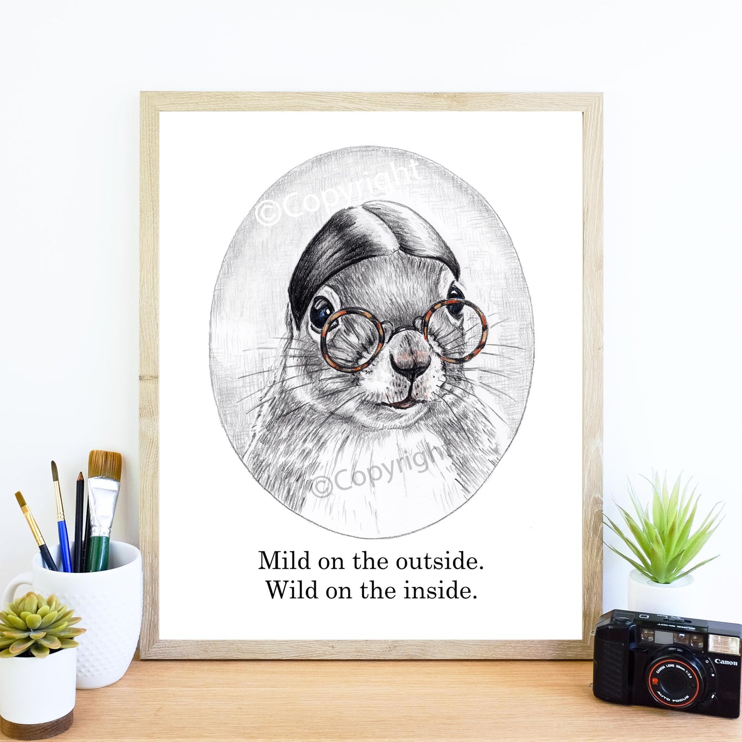 Crayon drawing of a mild mannered squirrel with slicked hair and round glasses. Art by Deidre Wicks