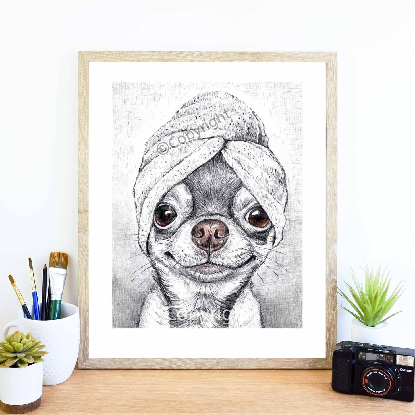 Crayon drawing of an adorable chihuahua dog wearing a bath towel on it's head. Art by Deidre Wicks