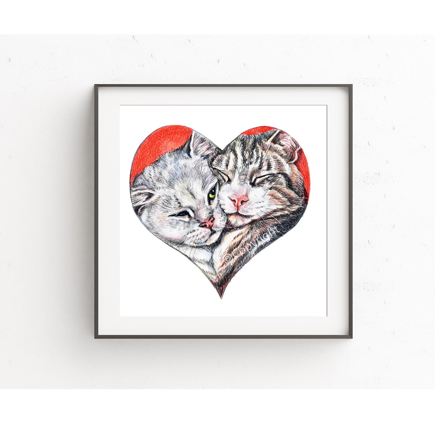 Coloured pencil drawing of a pair of bonded tabby cats shaped like a heart. Art by Deidre Wicks