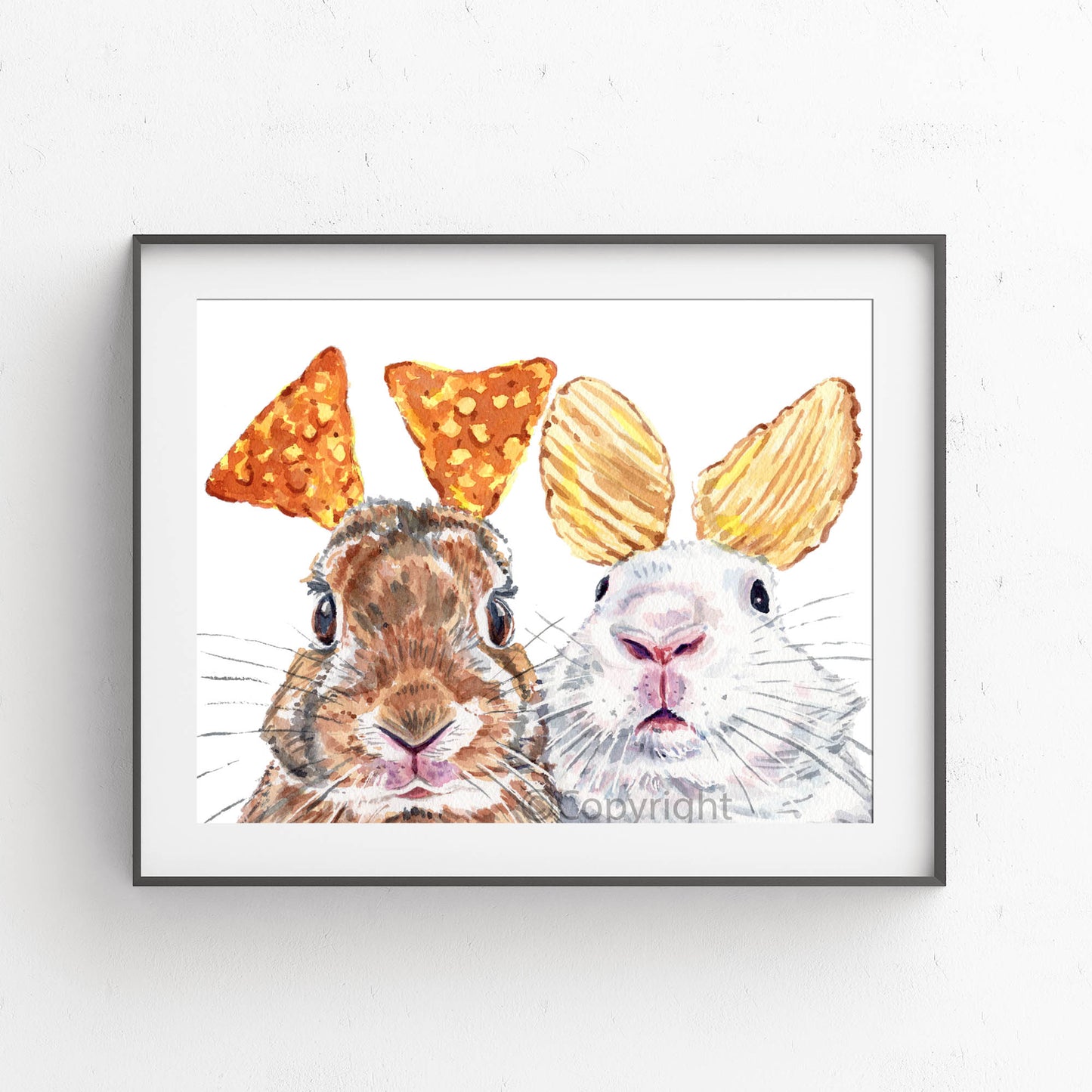 Two rabbits with ruffle chips and cheese nachos for ears on a white background. Watercolour painting by Deidre Wicks