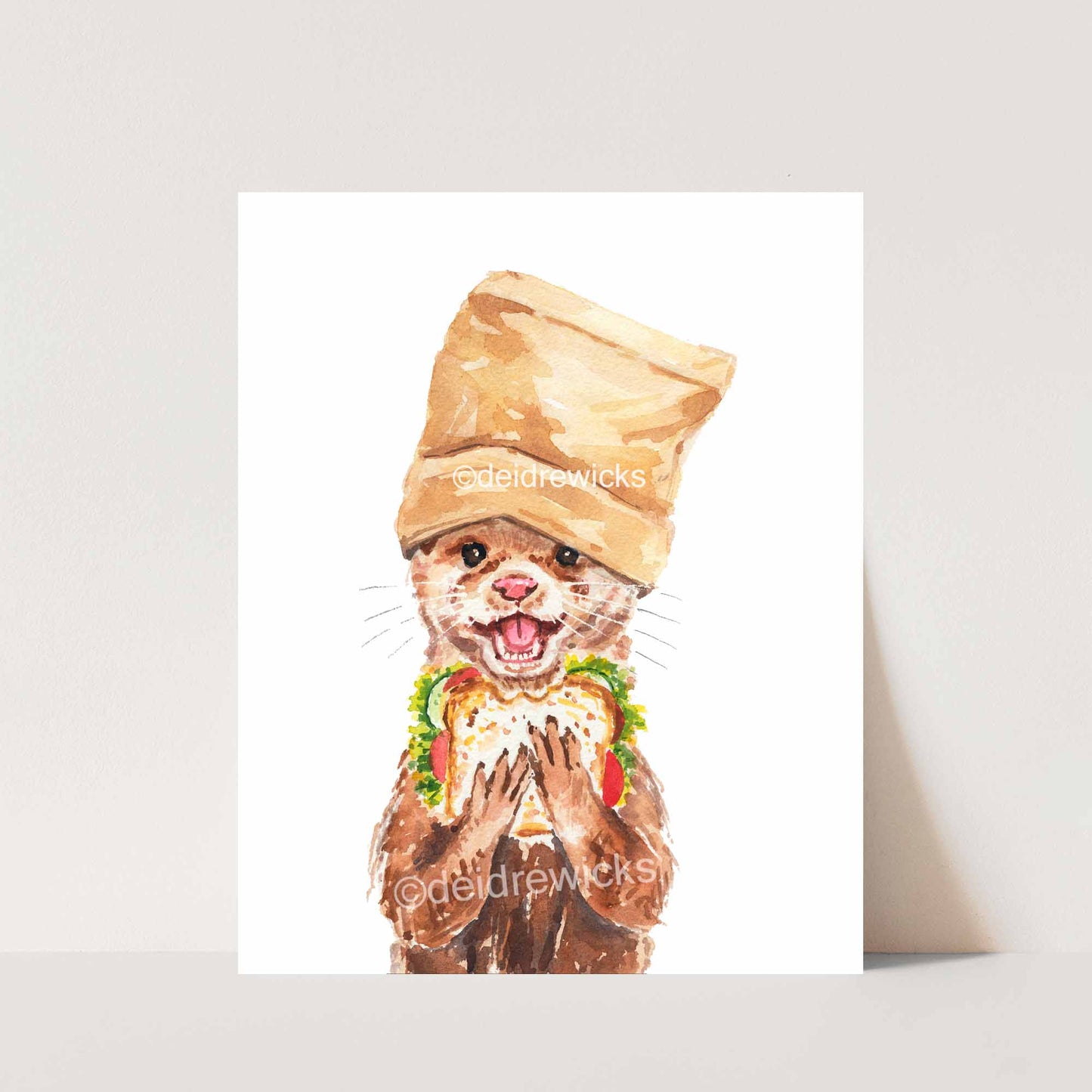 Otter eating a vegetable sandwich for lunch watercolour print by Deidre Wicks