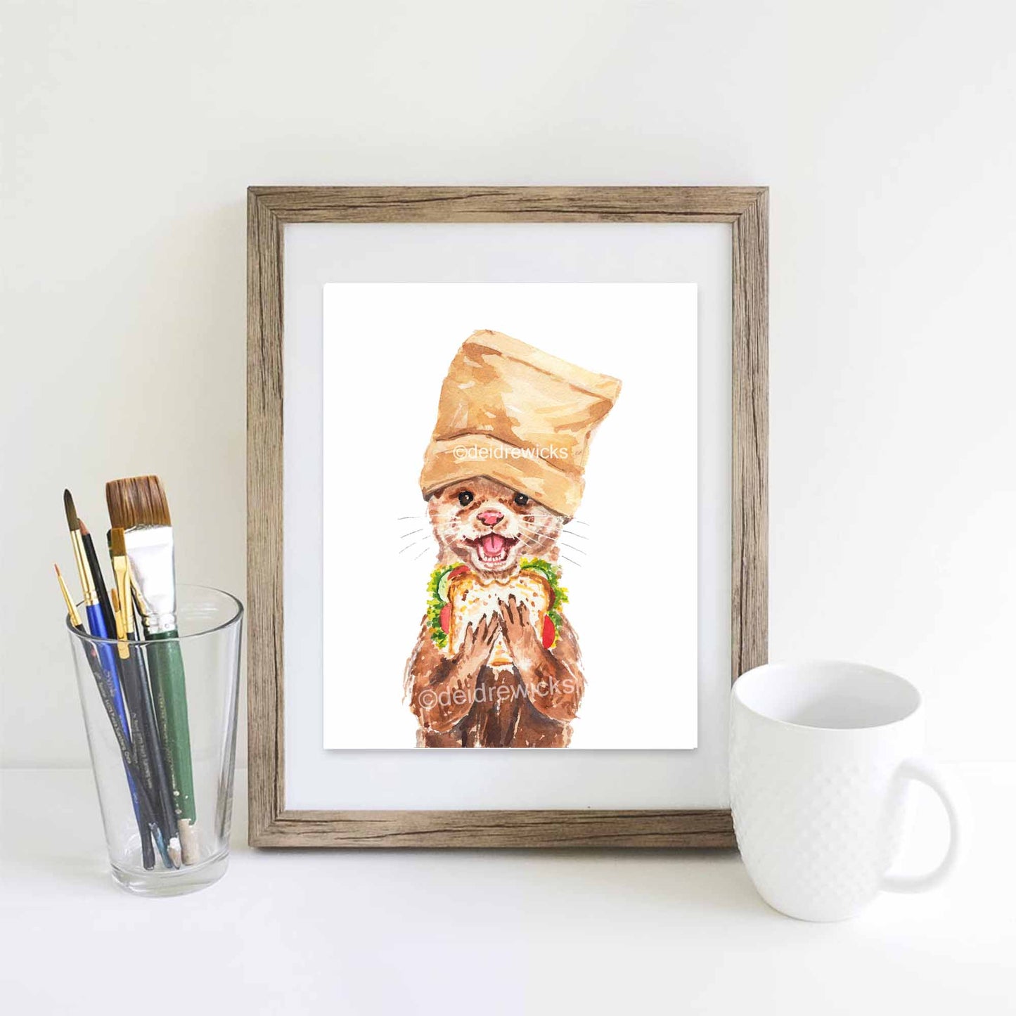 Framed example of an otter watercolour print by Deidre Wicks