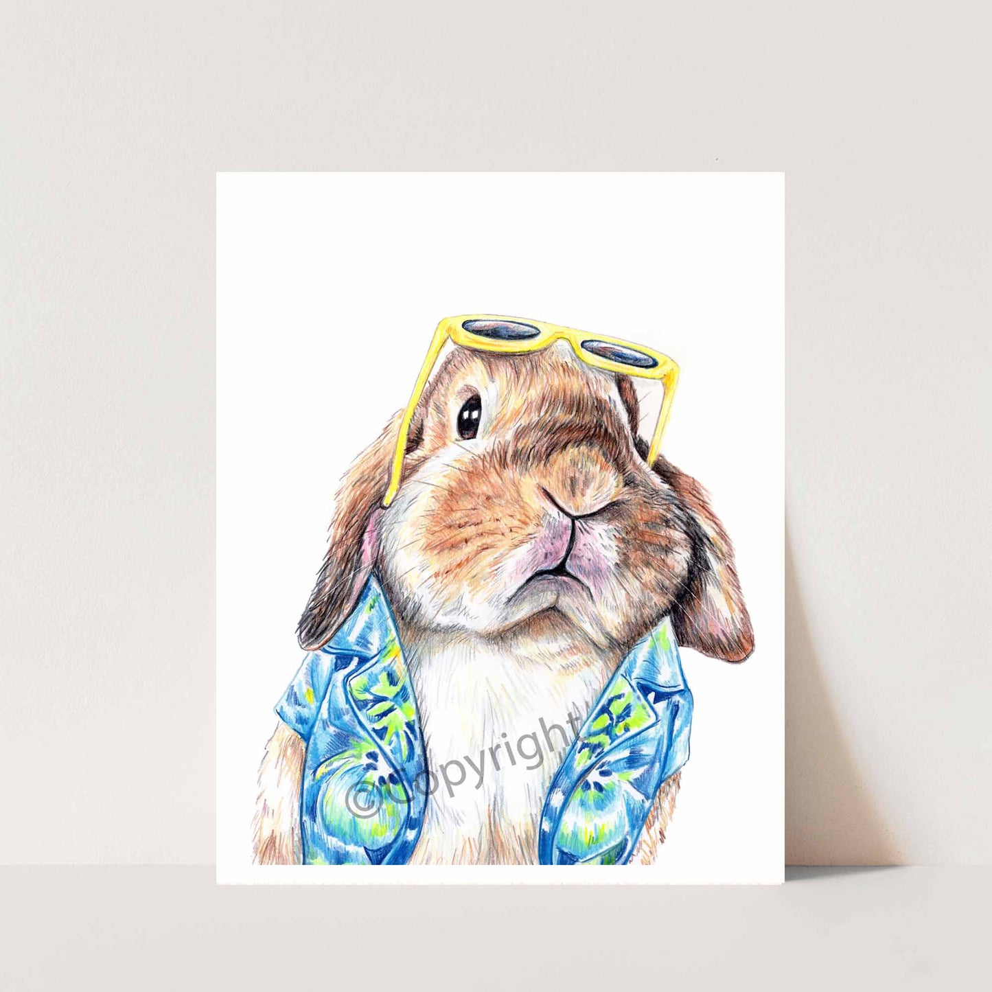 Print of drawing of a lop eared bunny rabbit wearing a Hawaiian shirt. Original crayon pastel drawing by Deidre Wicks