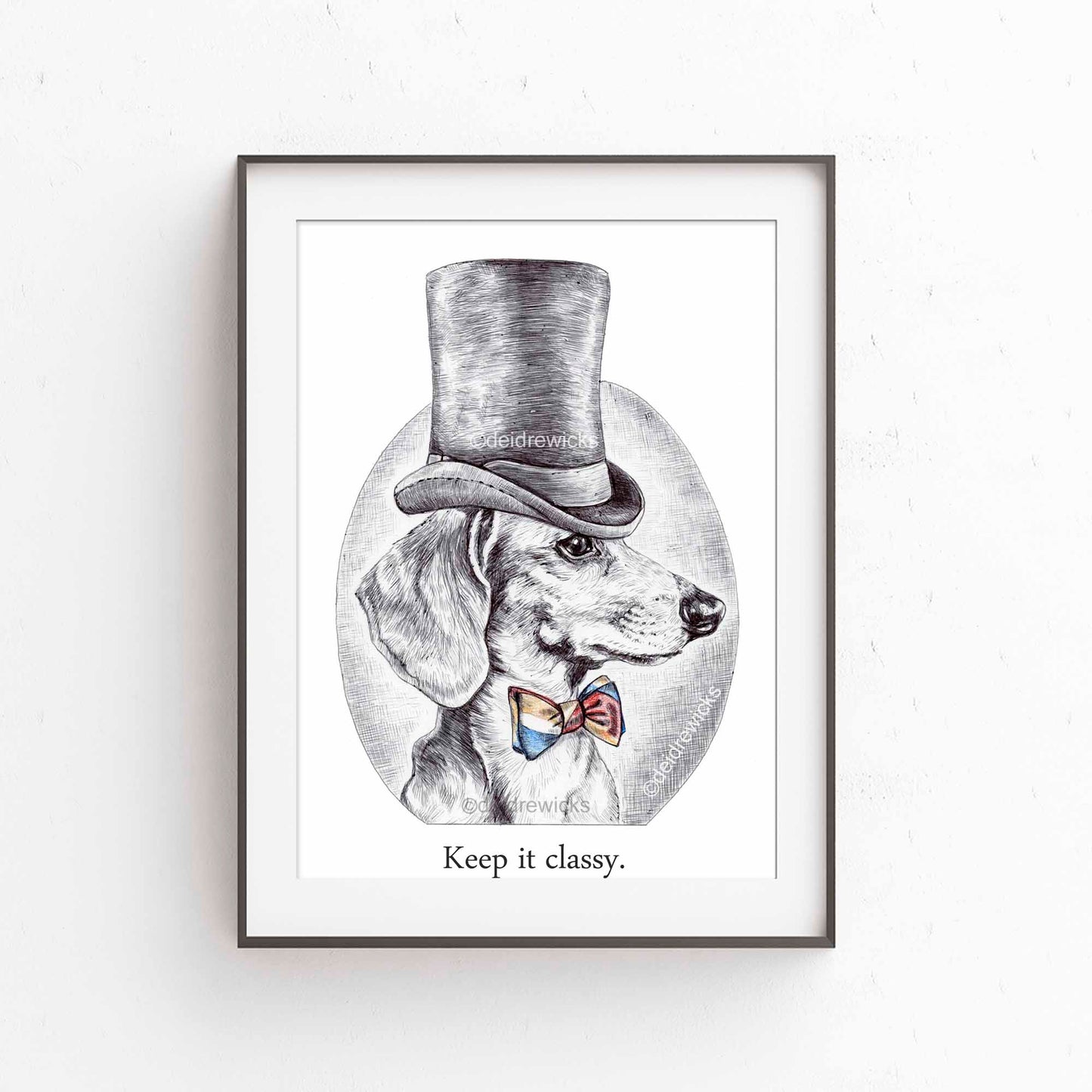 Framed example of a pen ink drawing of a dachshund dog wearing a top hat and bow tie. He's classy like that. By Deidre Wicks