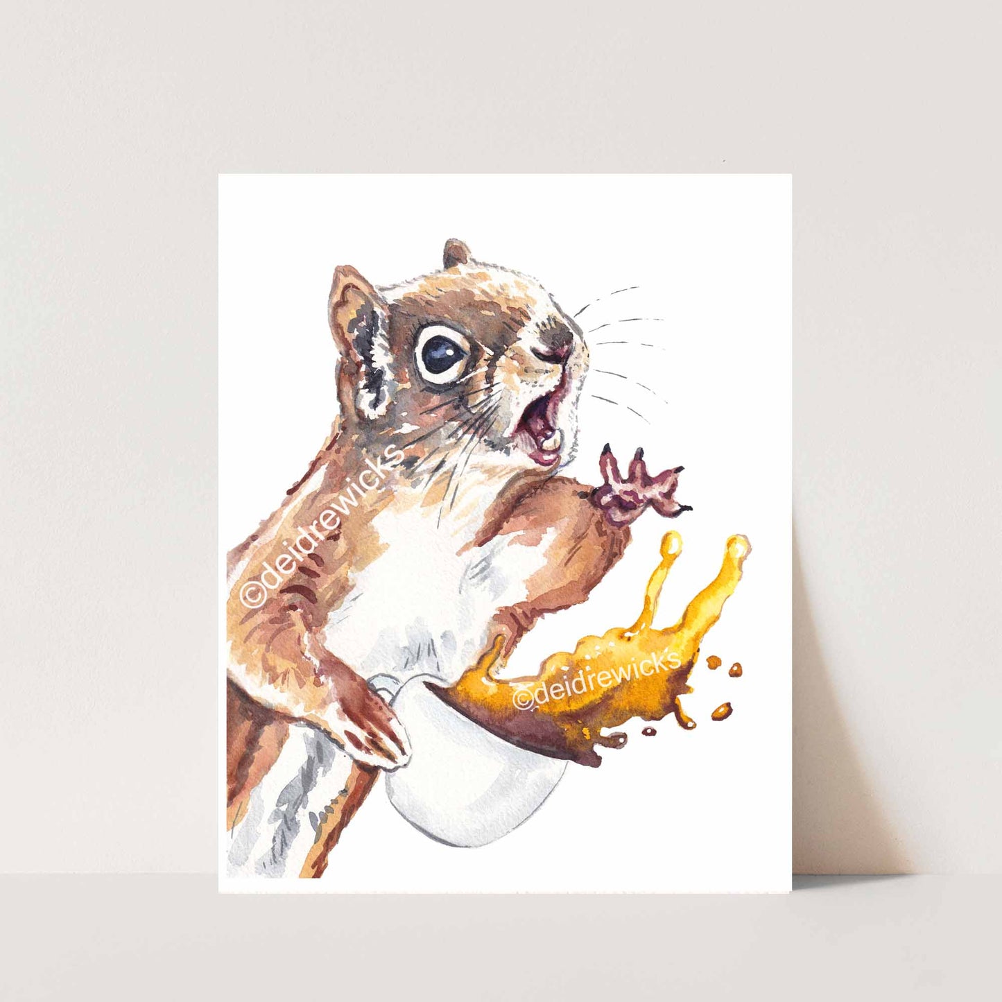 Squirrel watercolour print featuring the moment a cup of coffee is spilled. Illustration by Deidre Wicks