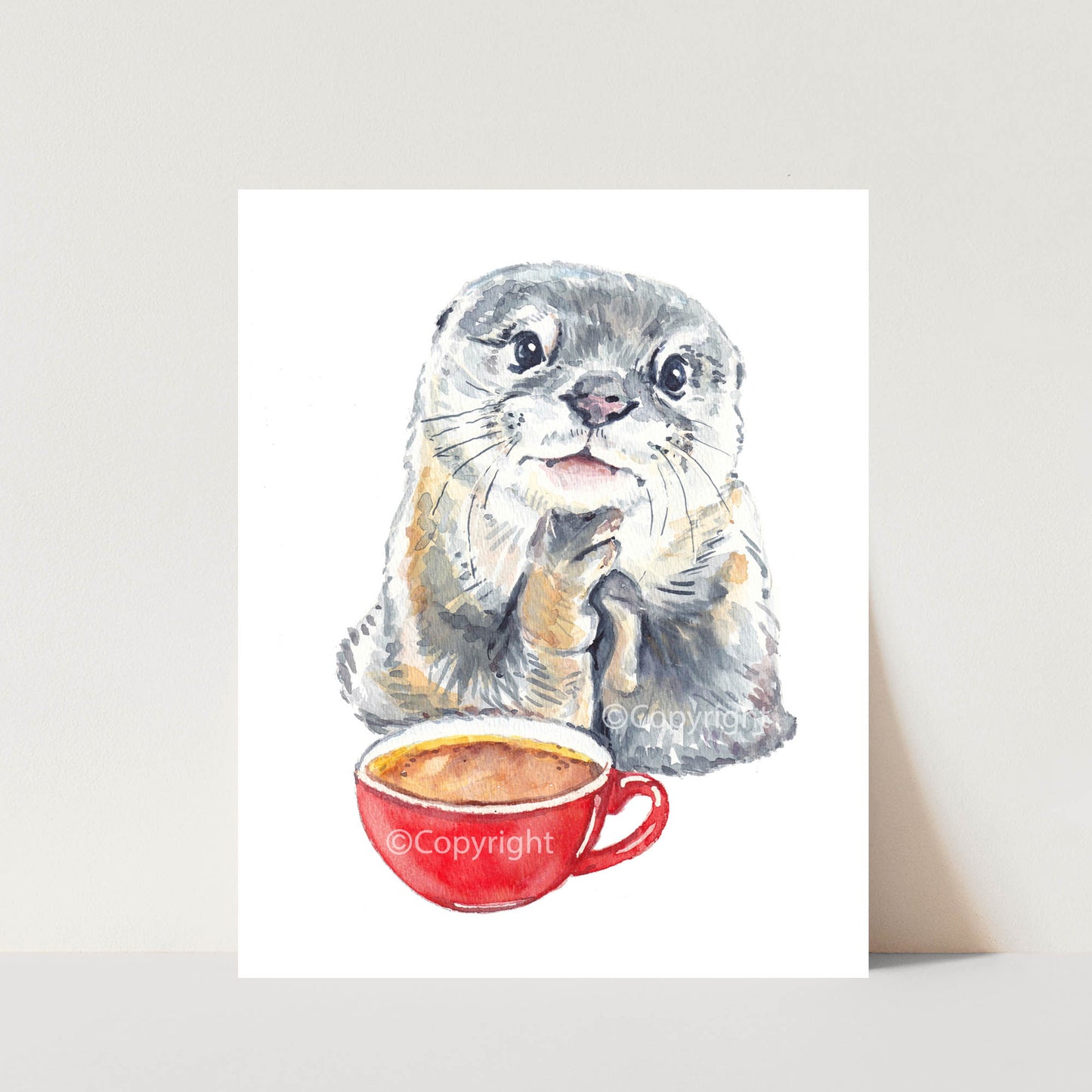 Watercolour painting of an otter daydreaming while drinking a cup of coffee at a cafe. Art by Deidre Wicks