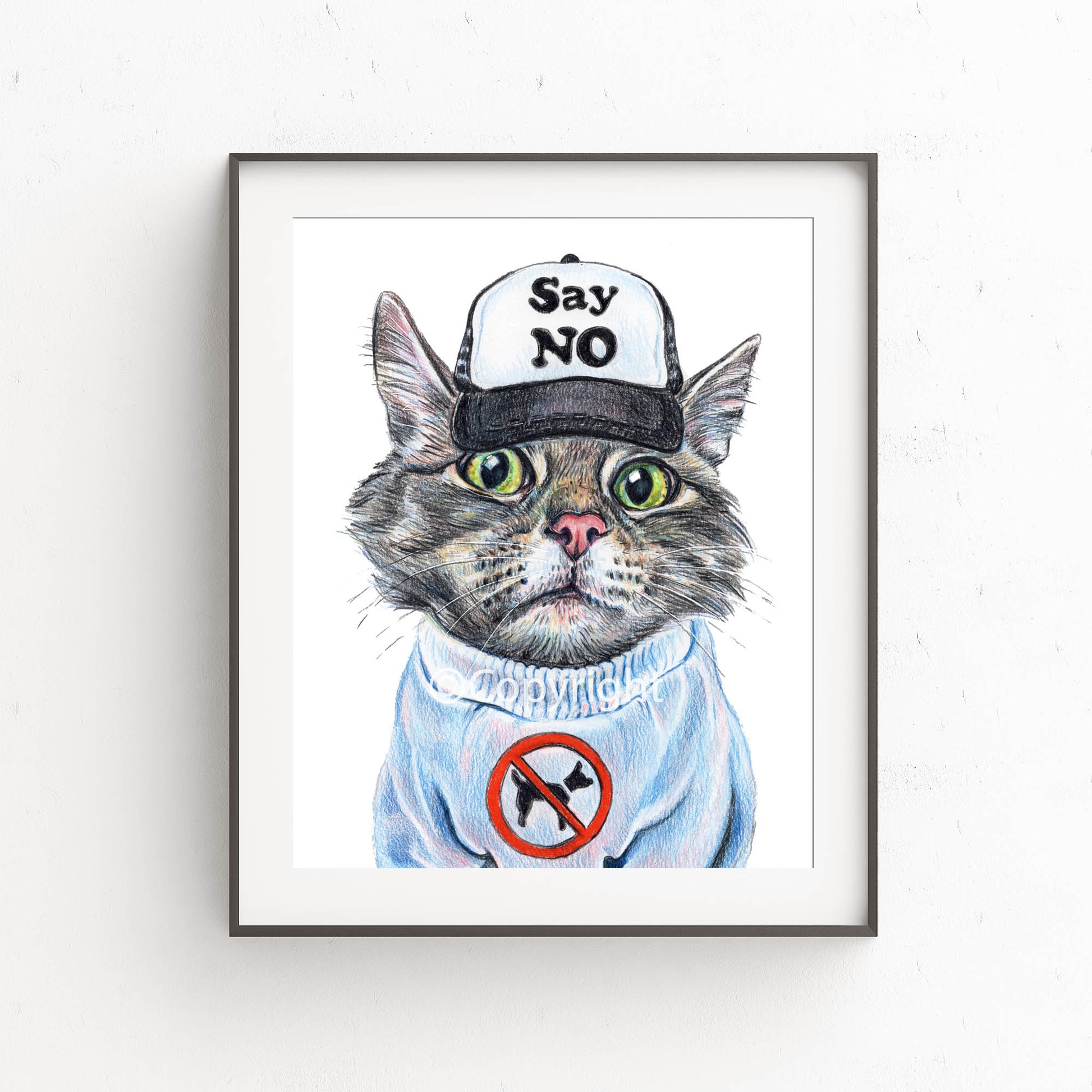 Framed artwork of a cat wearing a cap and sweater with a no-dogs sign on a white background