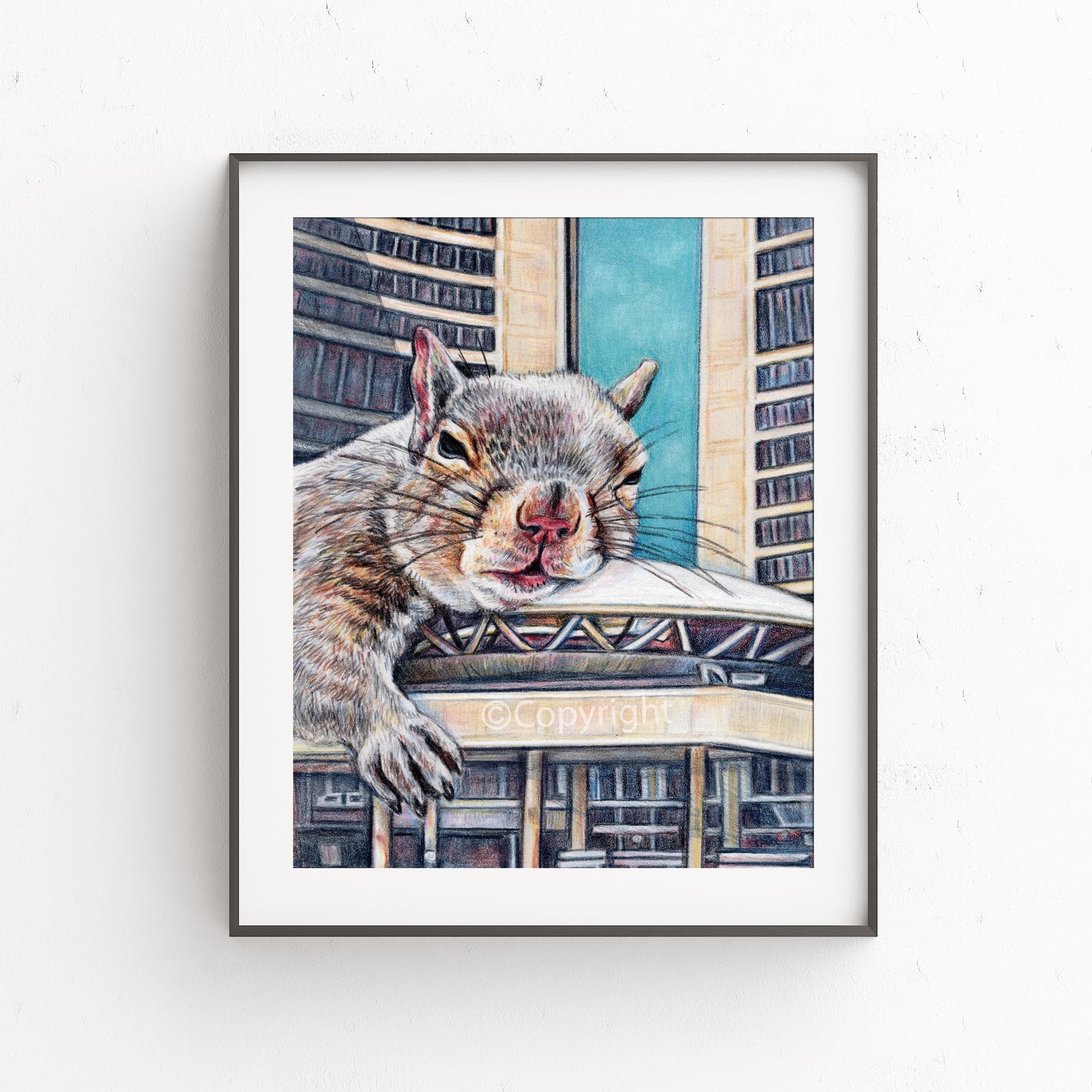 Framed artwork of a squirrel in an urban setting