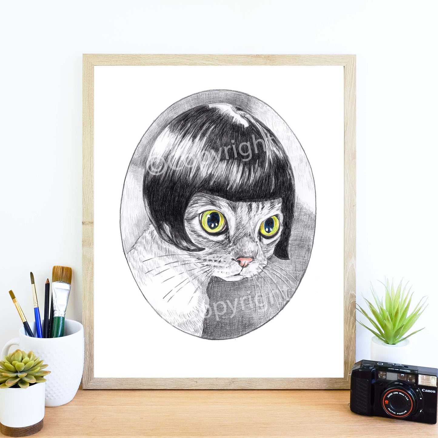 Black and white crayon drawing of a Siamese cat styled like a silent movie star. Art by Deidre Wicks