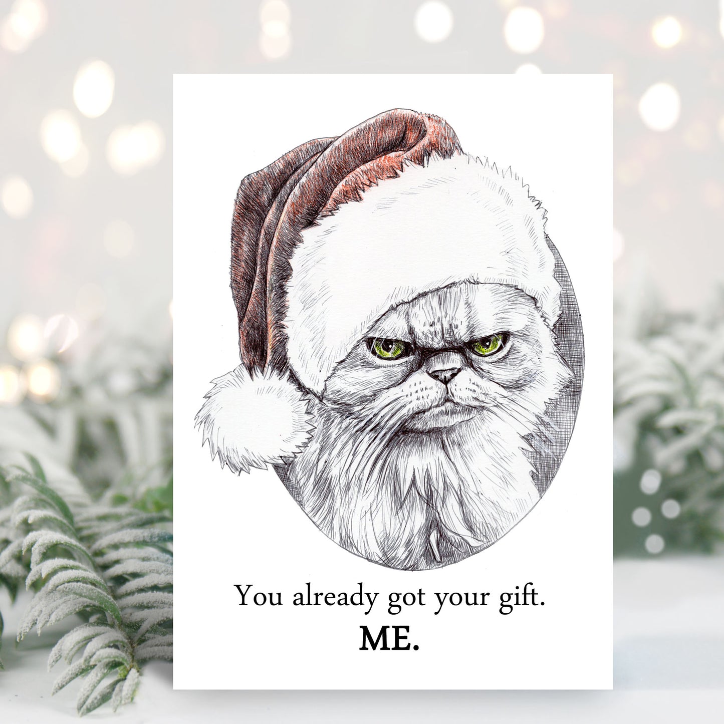 Christmas card featuring a ballpoint pen drawing of a grumpy cat wearing a Santa hat