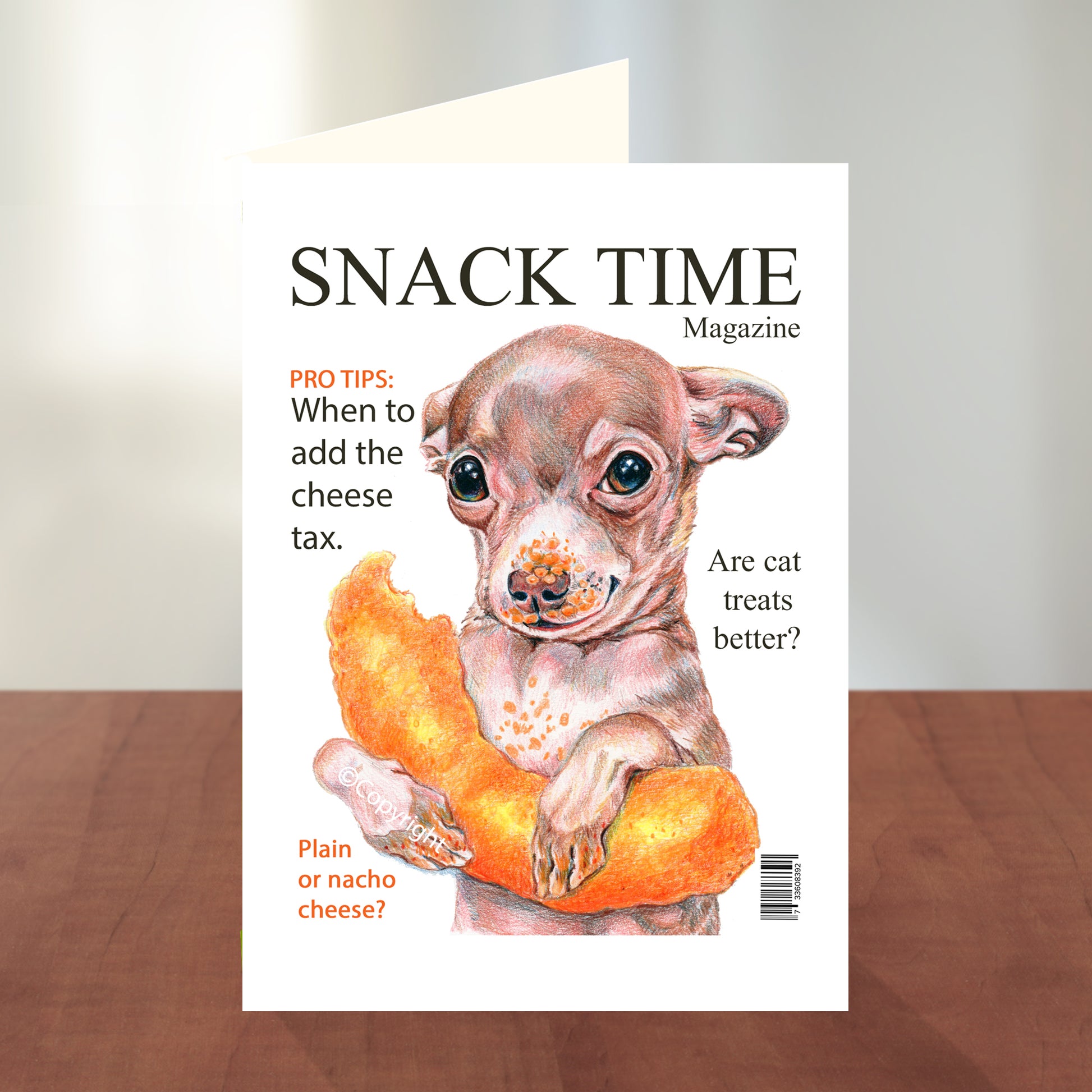 Greeting card featuring a coloured pencil drawing of Snack Time Magazine with a tiny chihuahua holding a cheese puff. By Deidre Wicks