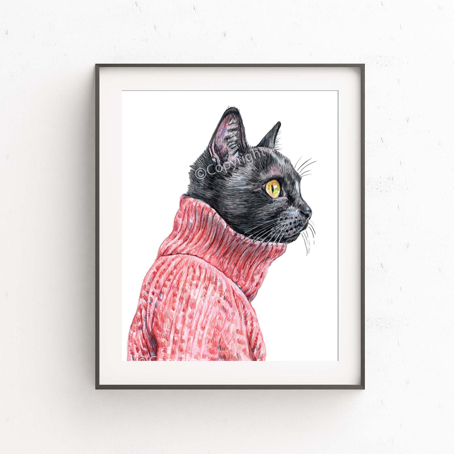 Coloured pencil drawing of a black cat in profile wearing a red turtleneck sweater. Art by Deidre Wicks