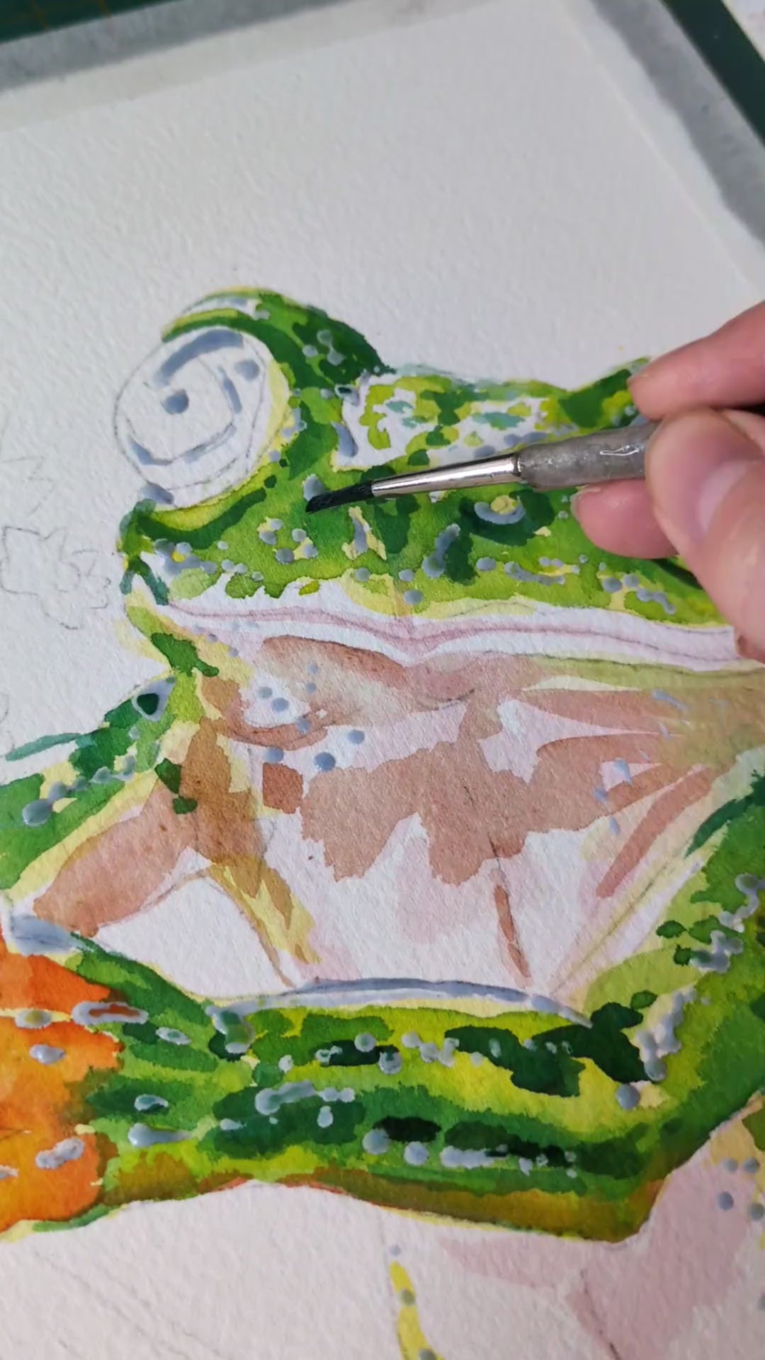 video of a tree frog watercolour painting work in progress