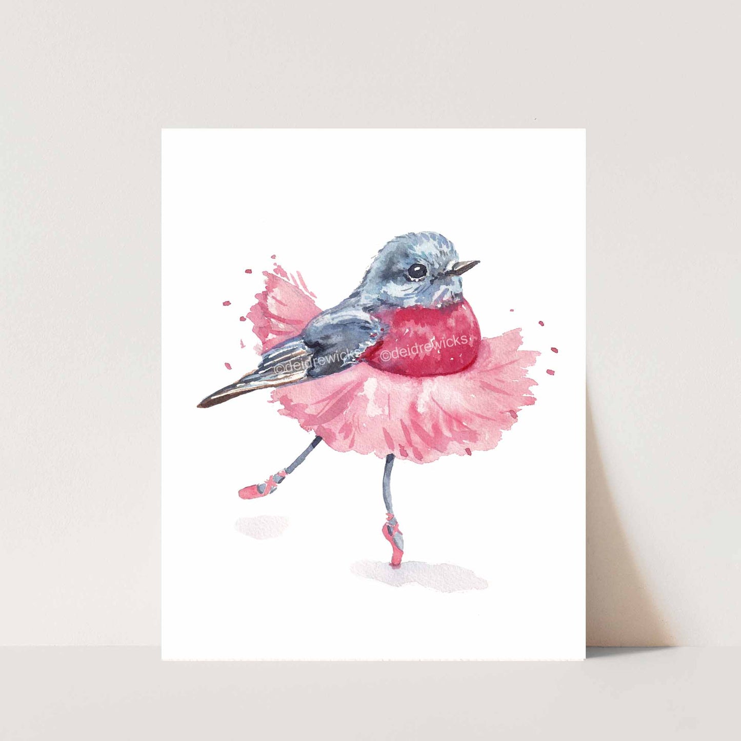 Ballet bird watercolour print of a rose robin wearing a pink tutu while dancing in pointe shoes. Art by Deidre Wicks