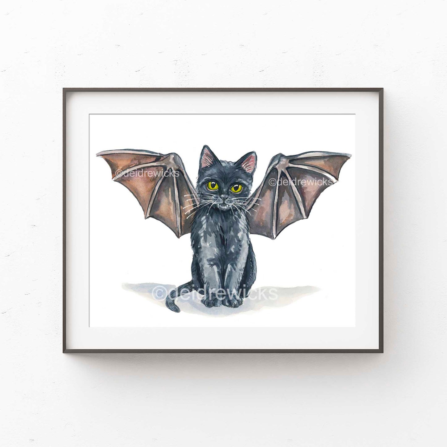 Framed example of a black cat watercolour nursery print by artist Deidre Wicks