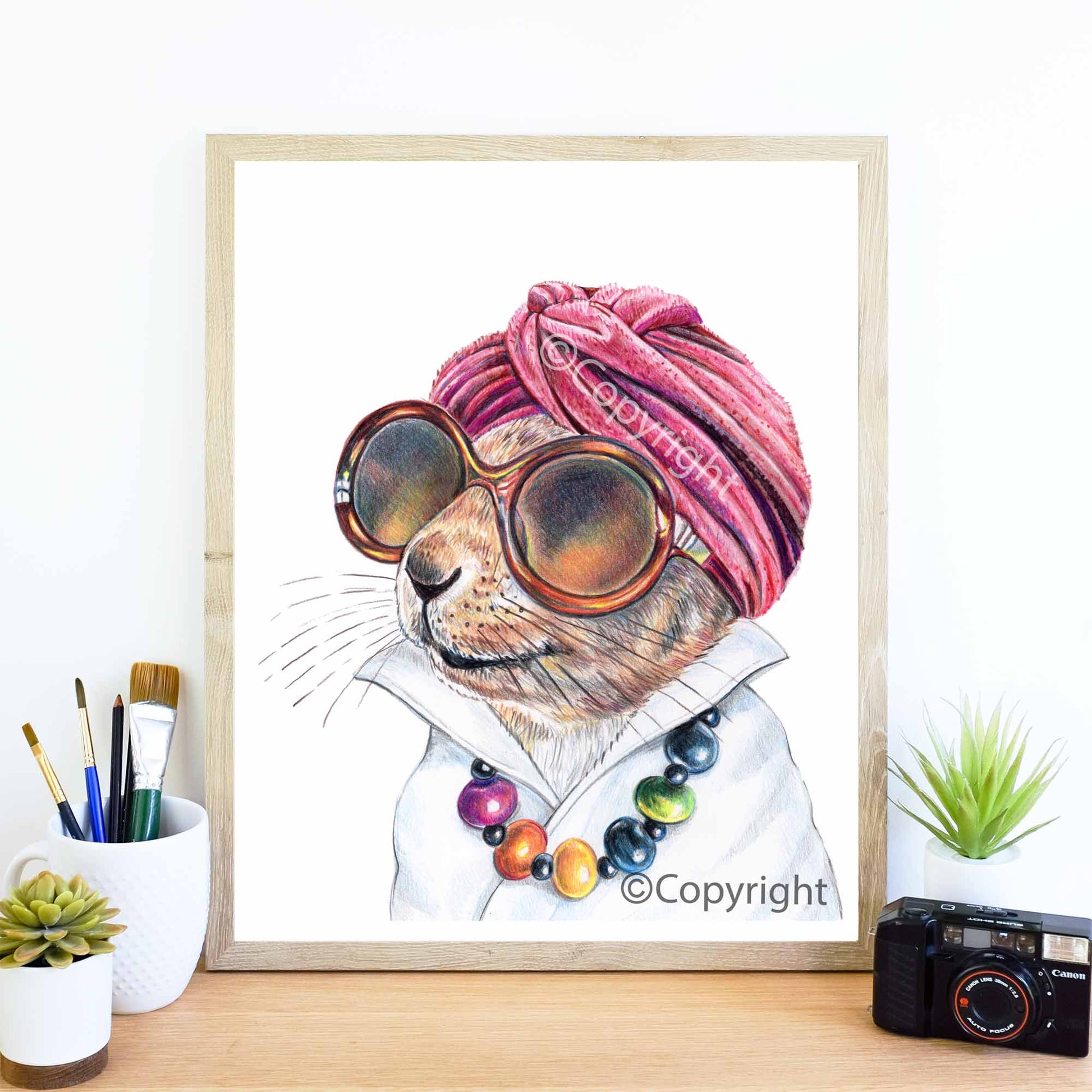Coloured pencil drawing of a squirrel wearing vintage sunglass, turban and necklace. She's a diva! Art by Deidre Wicks