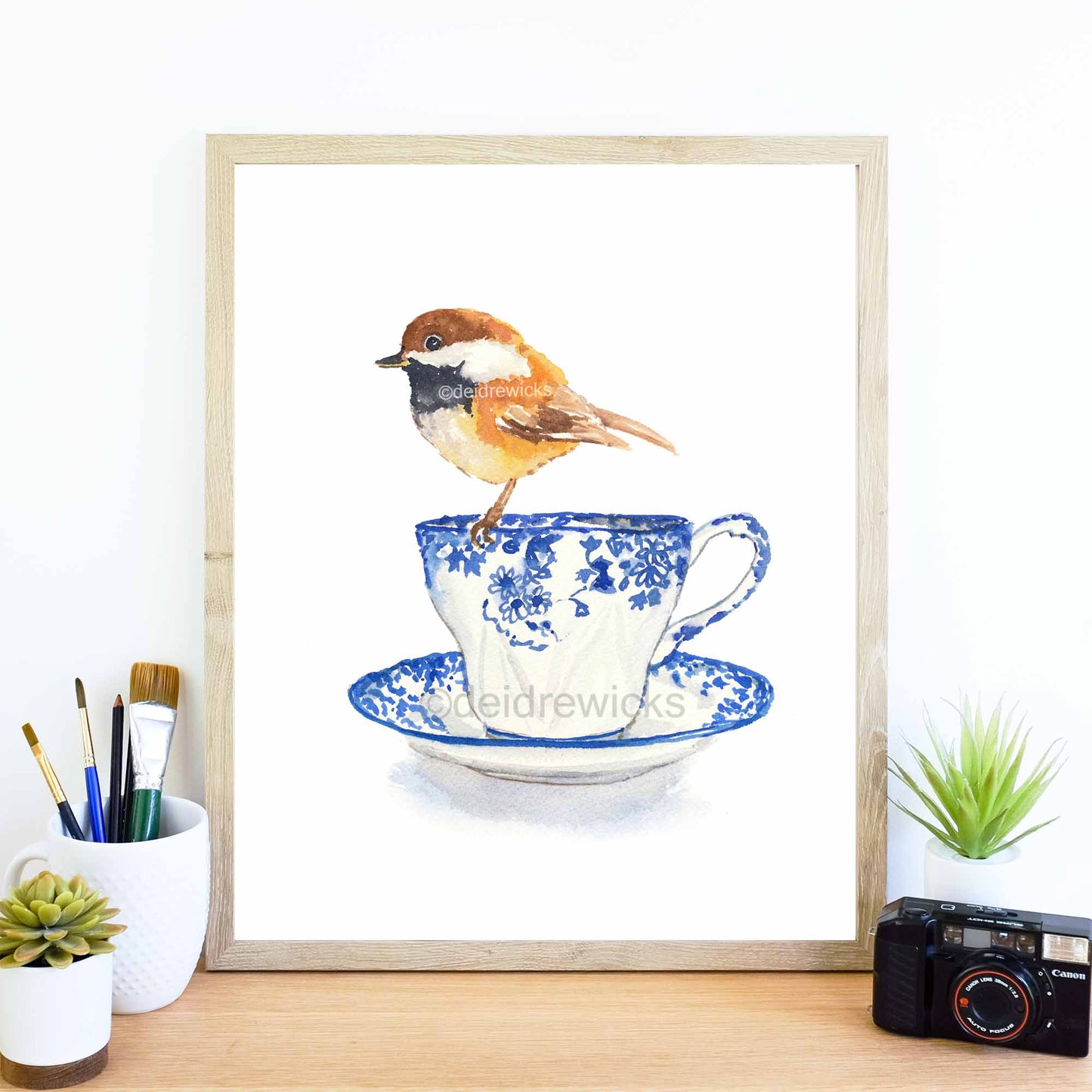 Print of a painting of a chickadee bird on a tea cup by Water In My Paint