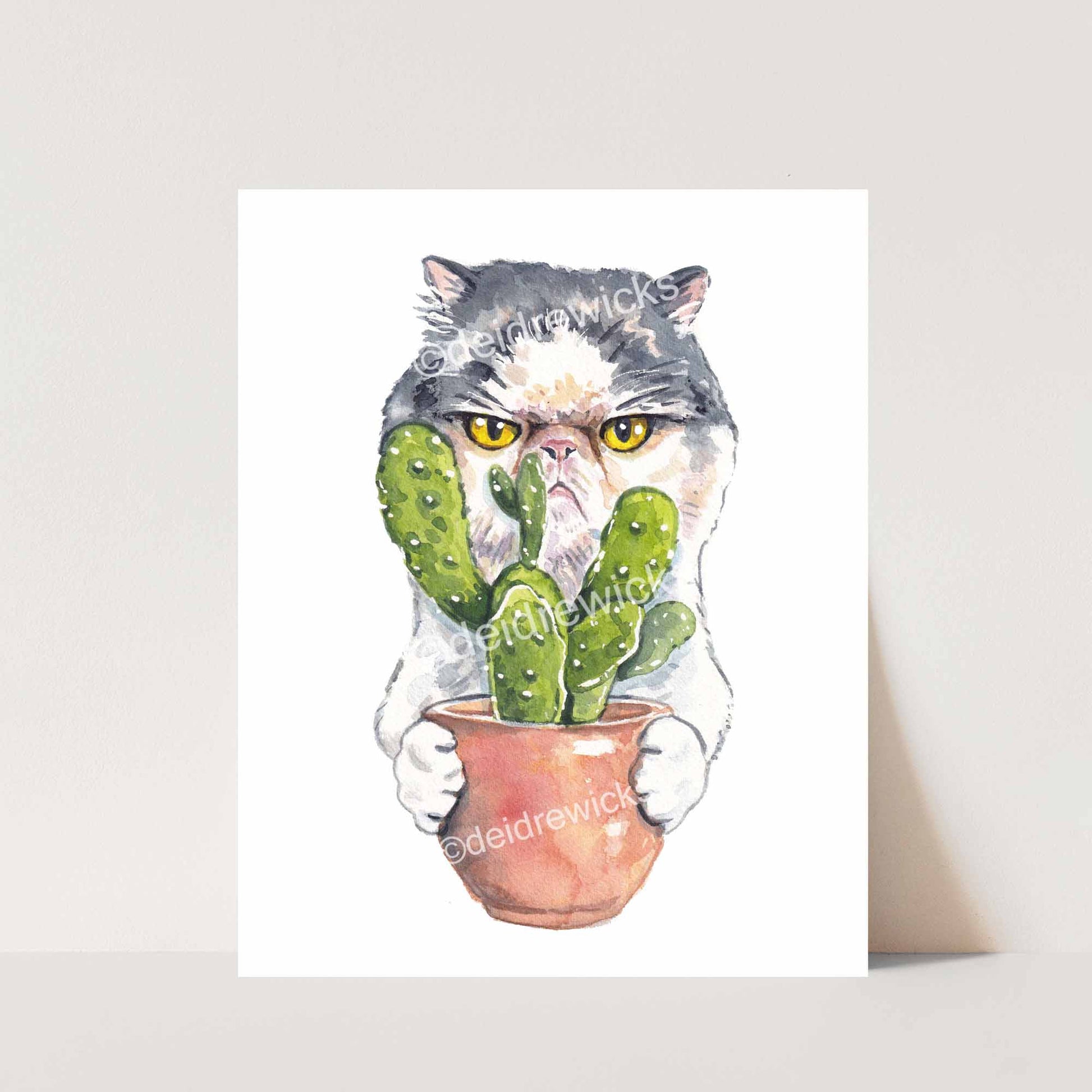 Cat Watercolor painting of a grumpy Tabby Persian holding a cactus