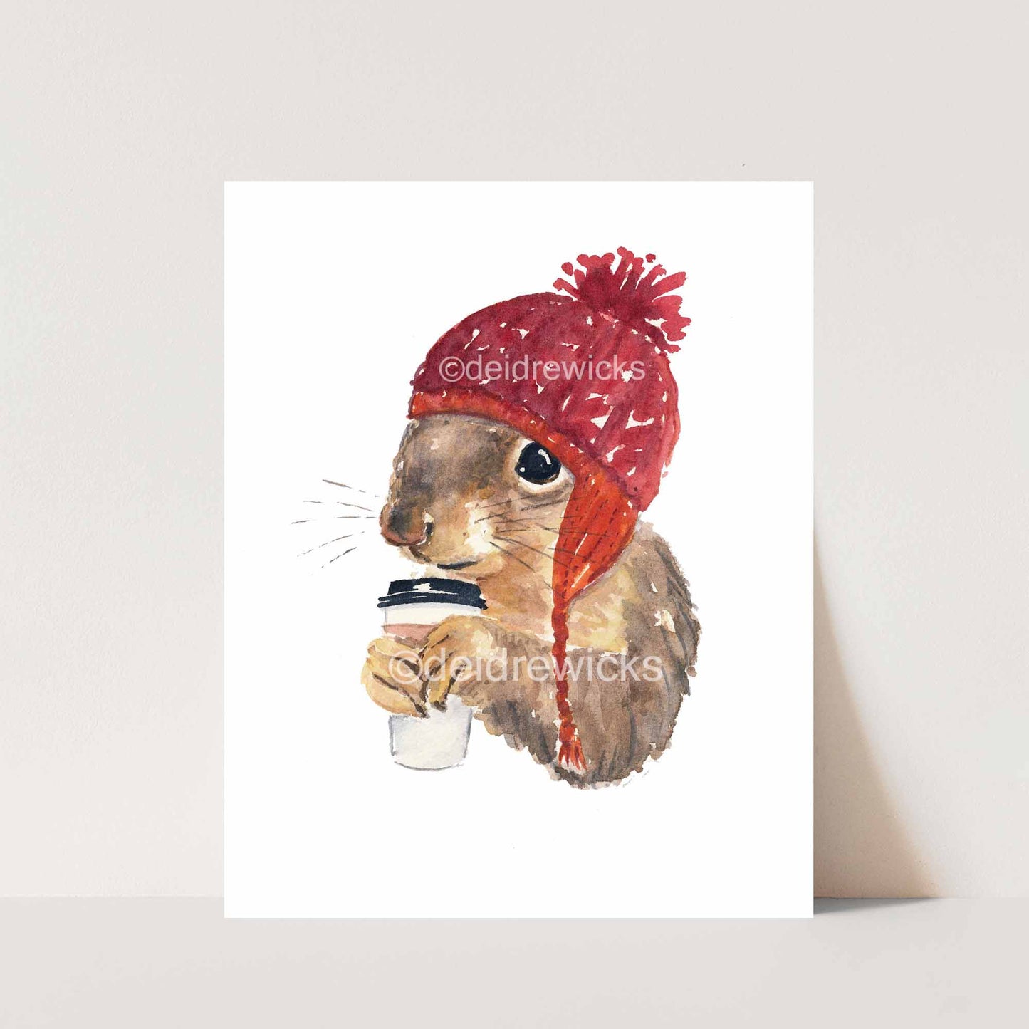 Animal watercolour painting of a squirrel wearing a hat and drinking coffee by artist Deidre Wicks