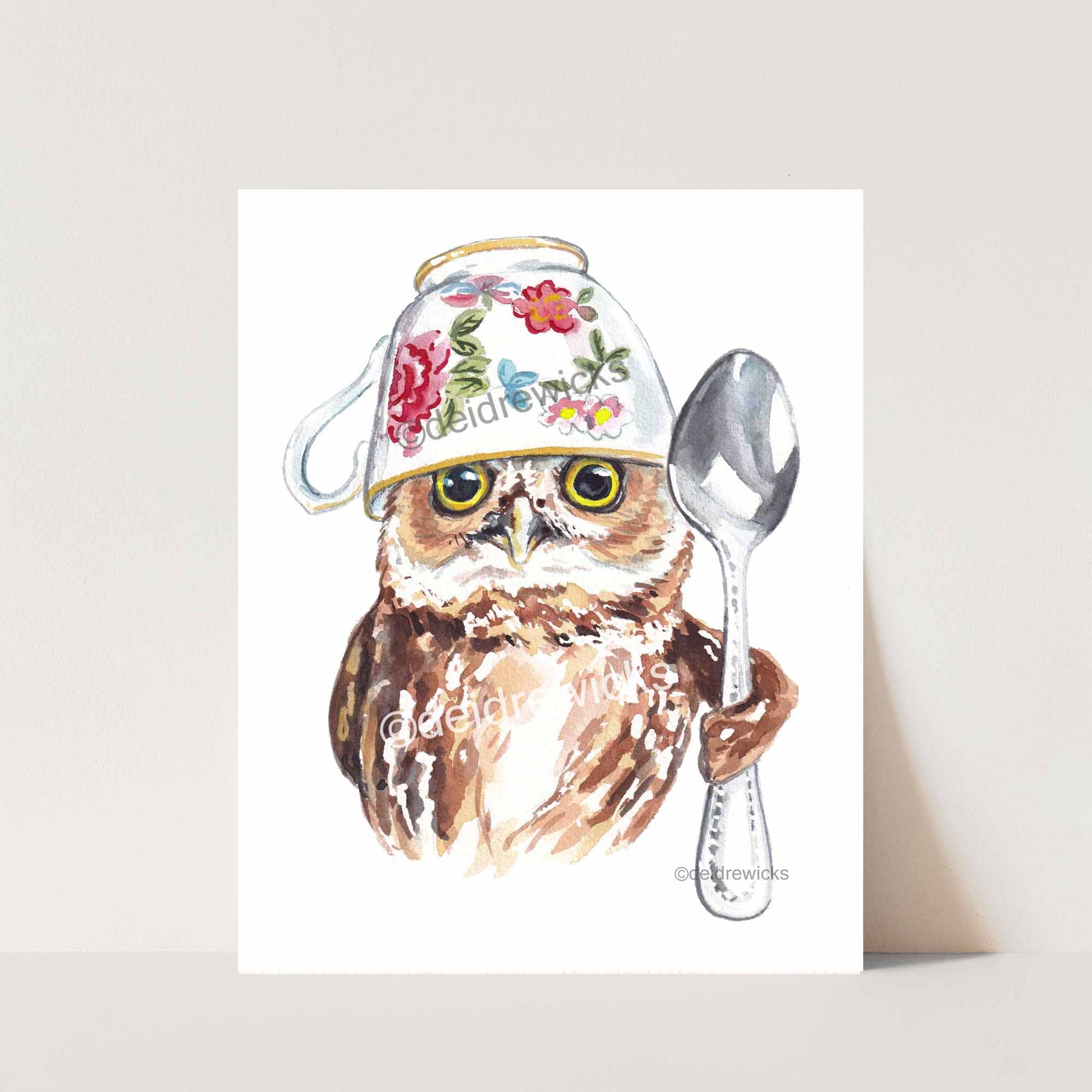 Northern Saw Whet owl with a tea cup and spoon, watercolor painting by Deidre Wicks