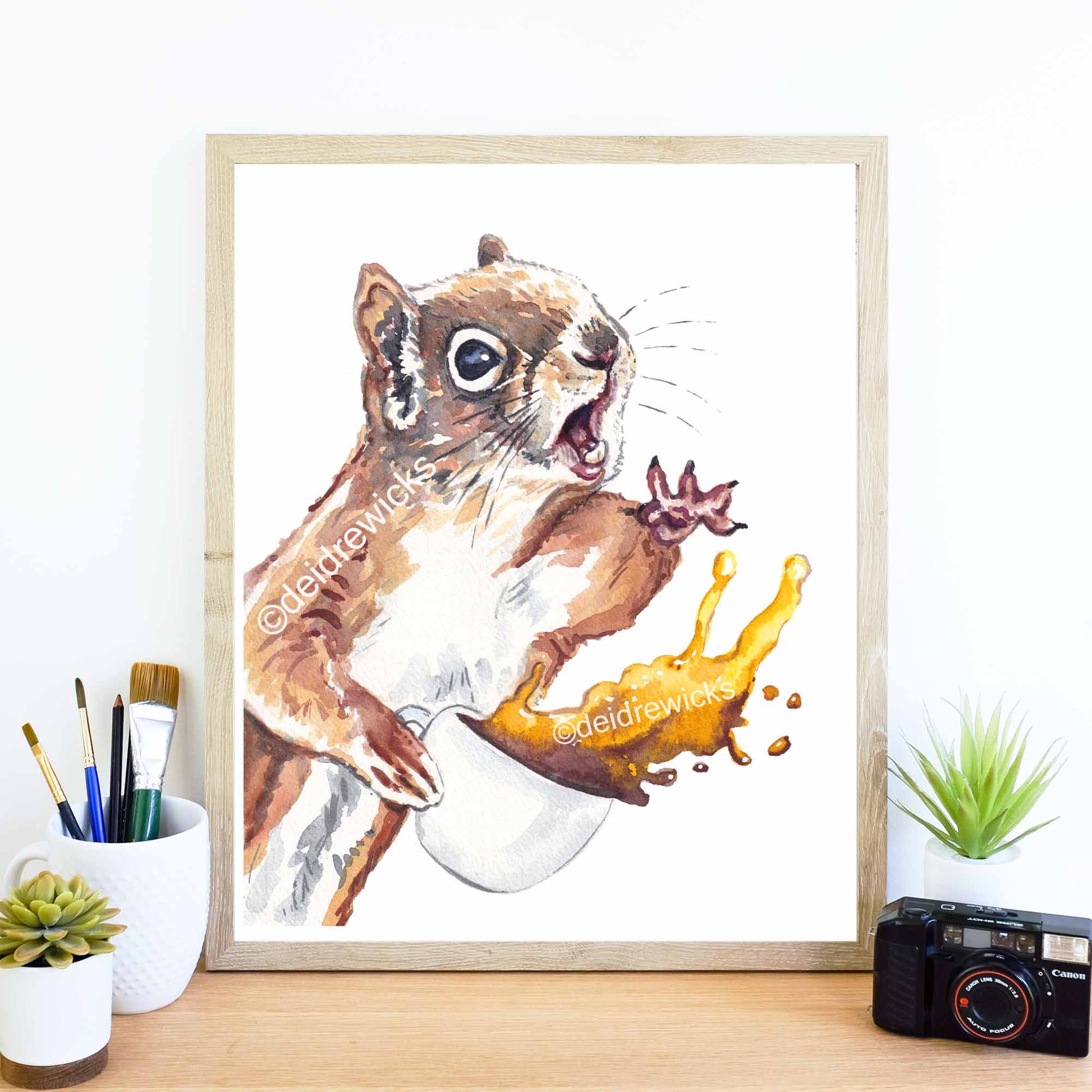 Framed example of a coffee squirrel watercolour painting by Deidre Wicks