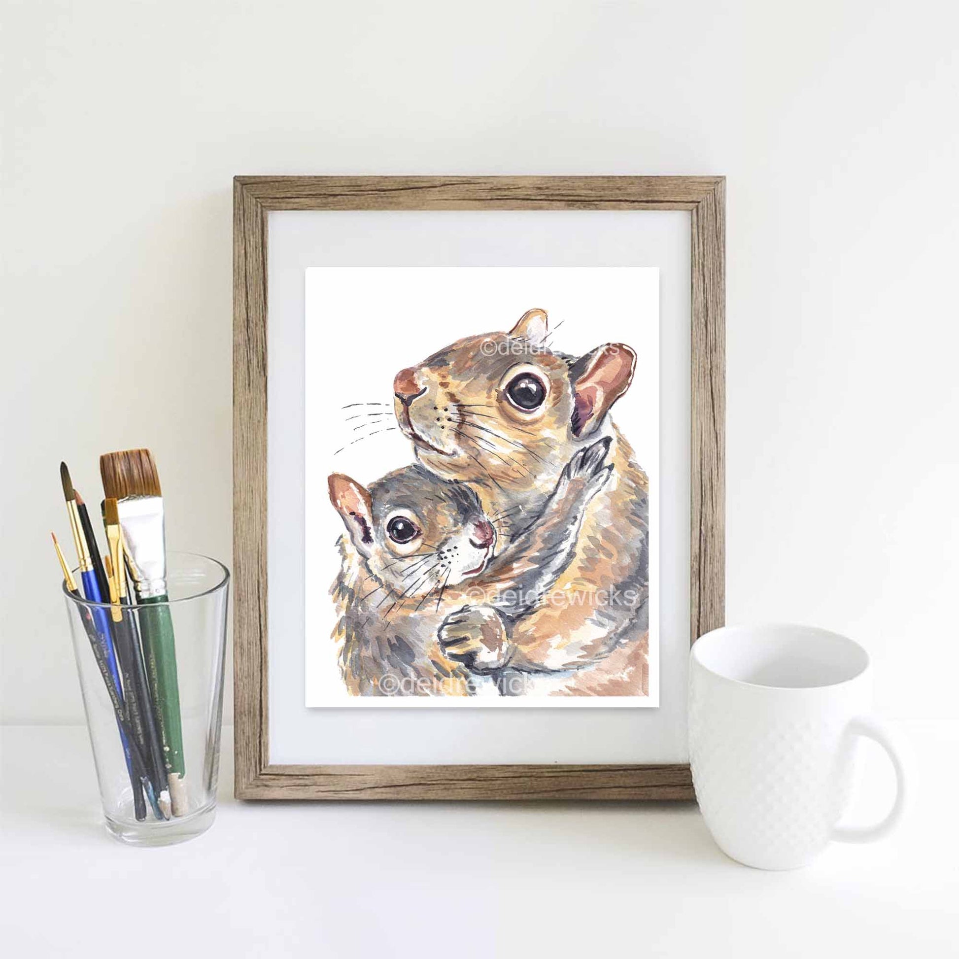 Framed example of a mother and child squirrel watercolour painting by Deidre Wicks