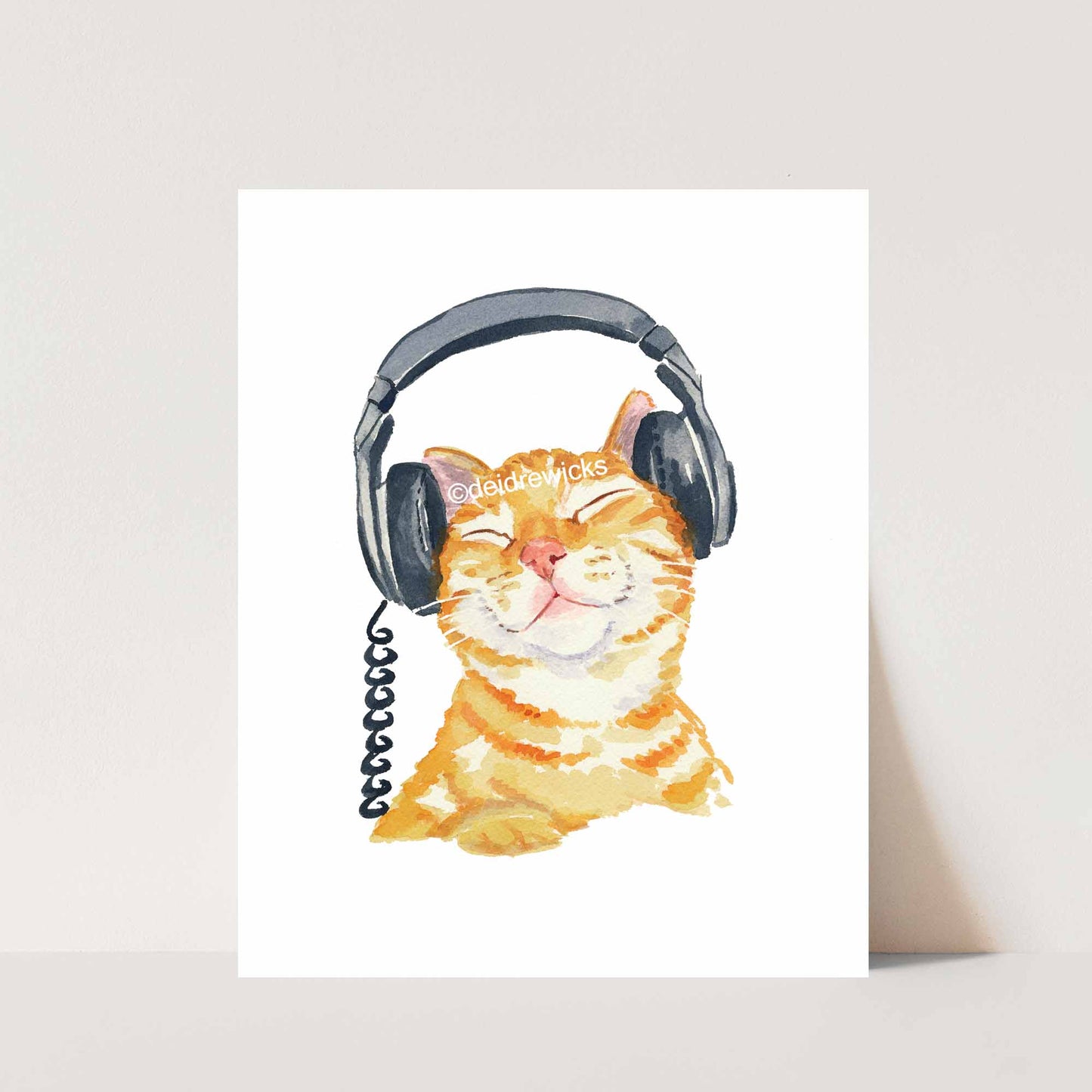 Cat Watercolour print of a ginger tabby cat wearing music headphones. Original art by Deidre Wicks